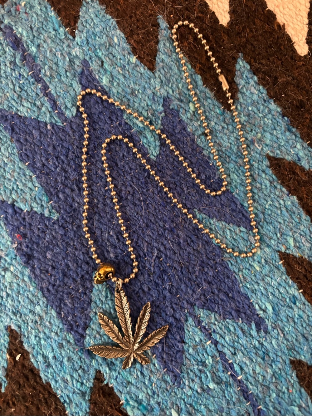 Silver Sweet Leaf Pendant Necklace with Skull Accent